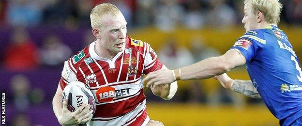 Warrington's Kurt Gidley gets the tackle on Wigan's Liam Farrell