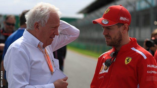 Charlie Whiting and Sebastian Vettel