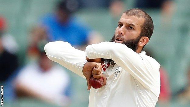 Moeen Ali bowls