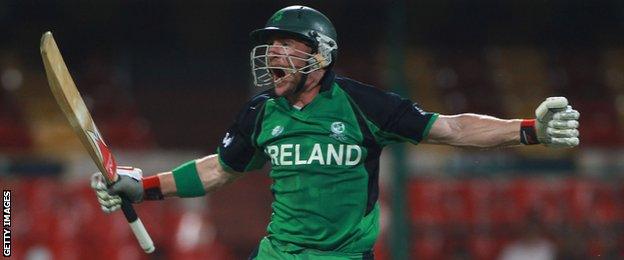 John Mooney celebrates after hitting the winning runs in Ireland's World Cup win over England in 2011