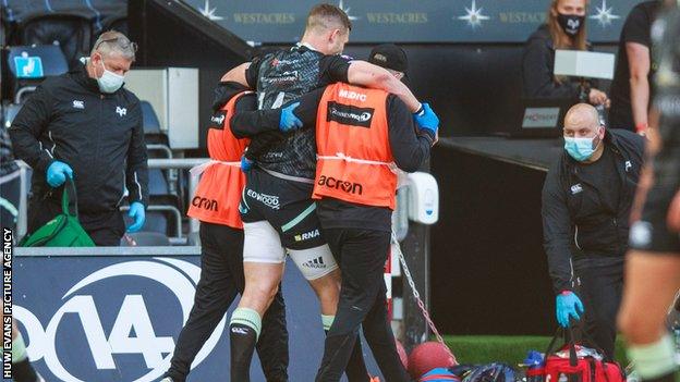 George North was helped off the field against Cardiff Blues