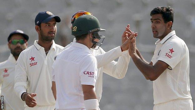 India's Ravichandran Ashwin (right) celebrates a wicket