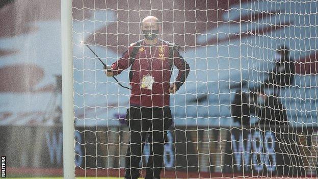 The goalposts at Aston Villa's Villa Park being cleaned