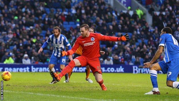 Brighton defender Connor Goldson diverts the ball past his own goalkeeper, David Stockdale