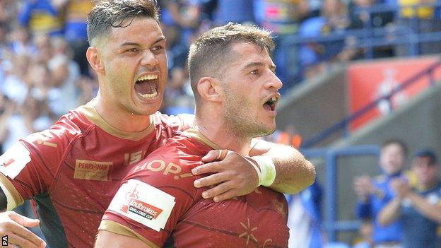 Catalans Dragons celebrate a try