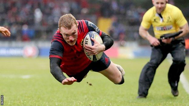 Keith Earls takes to the air as he goes goes over for a Munster try in the final pool game against Castres in Limerick