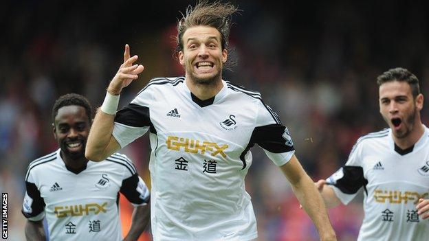 Michu celebrates a goal for Swansea