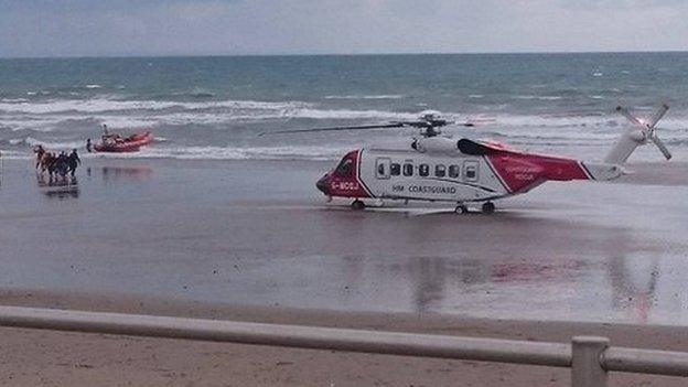 A rescue helicopter was called to the incident at Tywyn beach