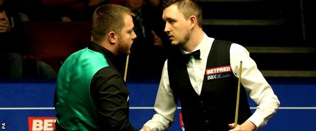 Mark Allen shakes hands with Kyren Wilson