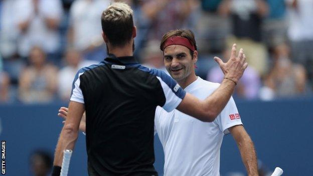 Roger Federer and Benoit Paire