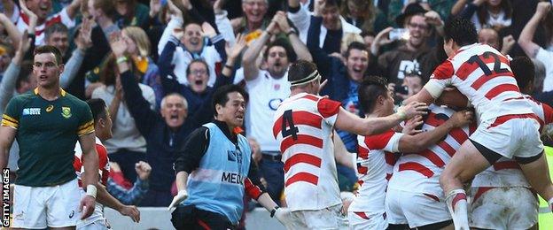 Japan's players celebrate their dramatic 34-32 World Cup win against South Africa