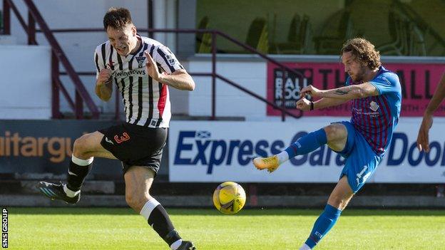 Inverness' Tom Walsh shoots during the cinch Championship match between Dunfermline and Inverness Caledonian Thistle