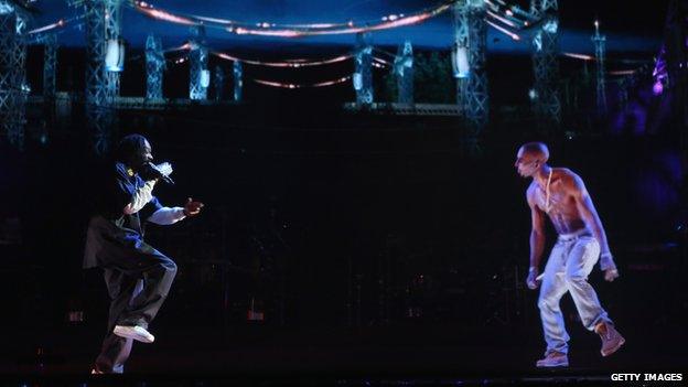 Snoop Dogg raps with hologram of Tupac Shakur