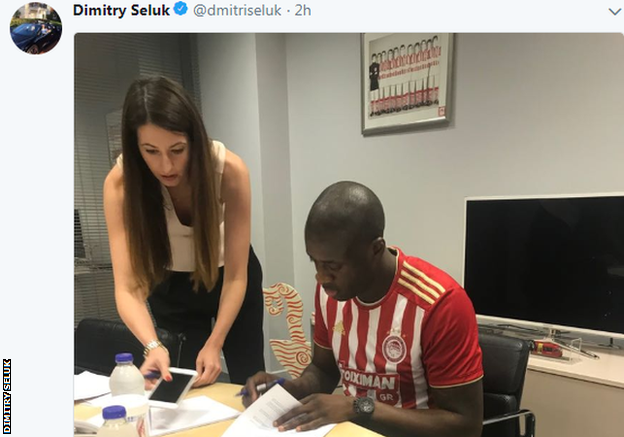 Toure's agent Dmitry Seluk tweeted an image of the midfielder signing papers in the Olympiakos home shirt