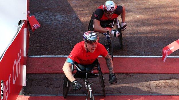 David Weir crosses the line to win the 2018 London marathon