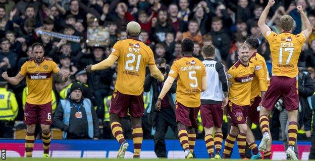 Peter Hartley celebrates with his Motherwell team-mates