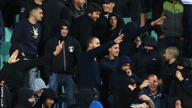 Fans at the Bulgaria v England game make what appear to be Nazi salutes