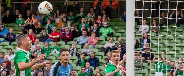 Jonathan Walters looked stunned after he hits the crossbar from two yards