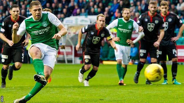 Grant Holt misses a penalty for Hibs