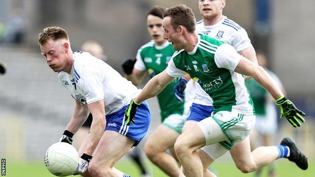 Fermanagh's Ciaran Corrigan battles with Monaghan's Ryan McAnespie at Clones last month