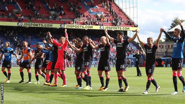 Huddersfield celebrate their first Premier League win