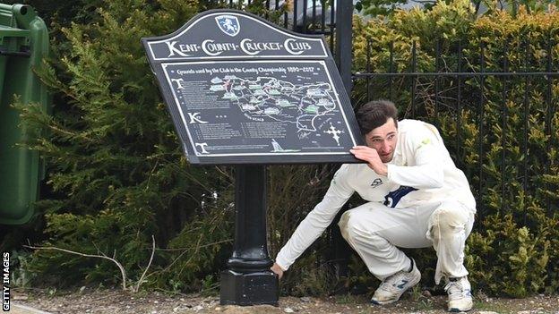 Glamorgan's Andrew Salter had to rummage around to retrieve the ball after a Darren Stevens boundary