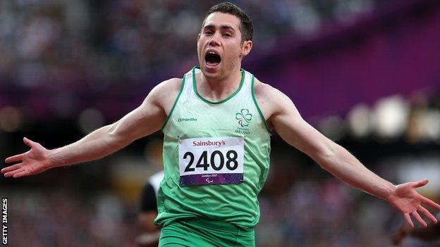 Jason Smyth celebrates after his T13 100m win at the London Paralympics