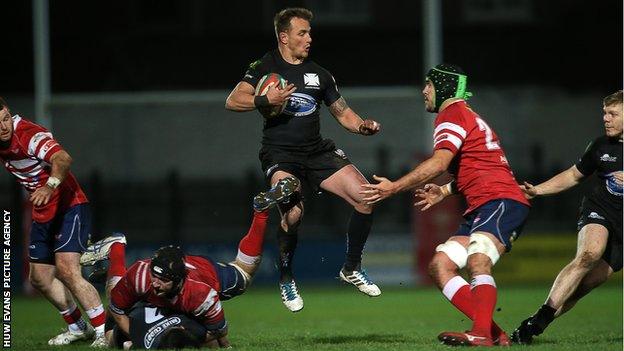 Neath captain Aaron Bramwell in action against Llanelli