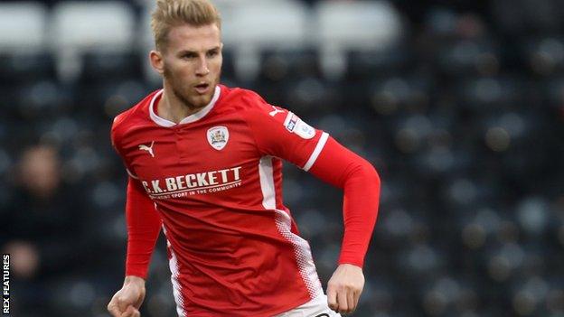 Jason McCarthy in action for Barnsley