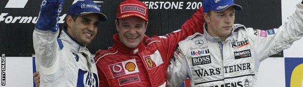 Kimi Raikkonen on the podium after the British GP in 2003