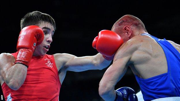 Conlan (left) lost controversially to Nikitin in Tuesday's quarter-finals