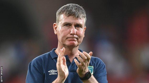 Stephen Kenny applauds the travelling Irish fans