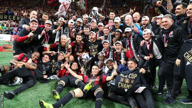 Atlanta United players celebrate after winning the MLS Cup