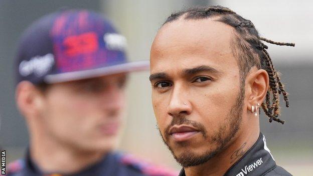 Lewis Hamilton (right)