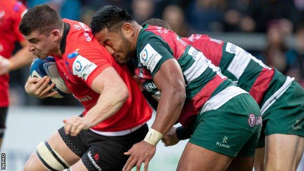 Nick Timoney retains possession for Ulster despite the attention of Manu Tuiliagi