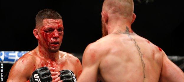 Diaz's face is left battered and bruised by McGregor's punches