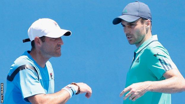 Colin Fleming (right) and partner Jonathan Erlich are through to the second round in Paris