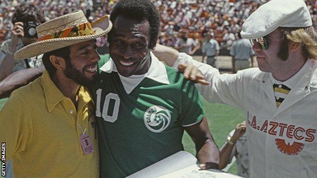 Pele, pictured with Brazilian musician Sergio Mendes and Elton John