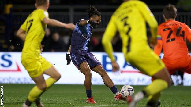 Garath McCleary scores Wycombe's second goal against Burton