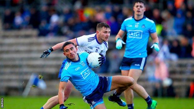 Monaghan's Dermot Malone challenges Dublin goalscorer Niall Scully