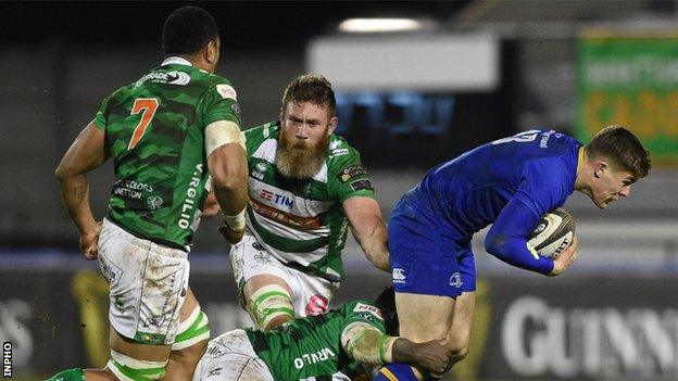 Garry Ringrose attempts to make a break in Treviso