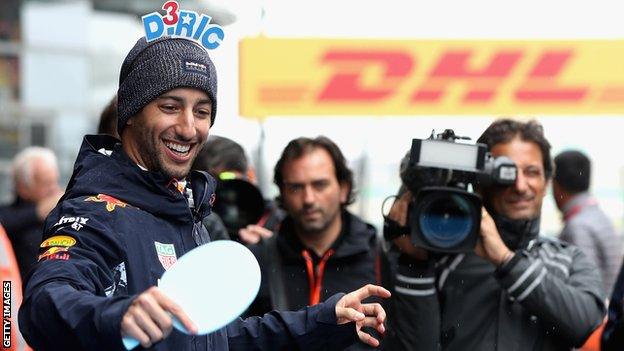 Red Bull driver Daniel Ricciardo plays table tennis ahead of the Chinese Grand Prix