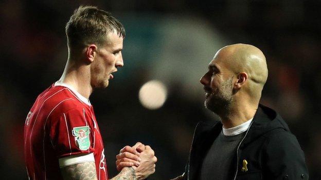 Aden Flint and Pep Guardiola