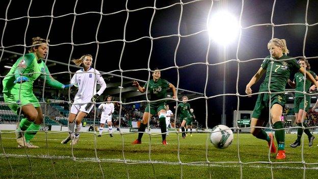 Diane Caldwell scores against Greece