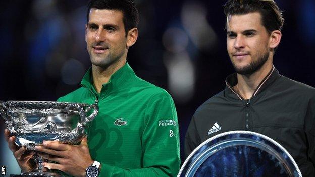 Djokovic and Thiem with their trophies