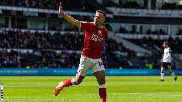 Andreas Weimann celebrates his goal against Derby