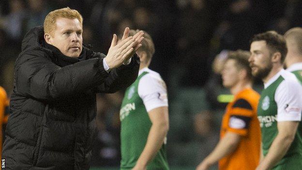 Hibs manager Neil Lennon applauds supporters after their 3-0 win over Dundee united