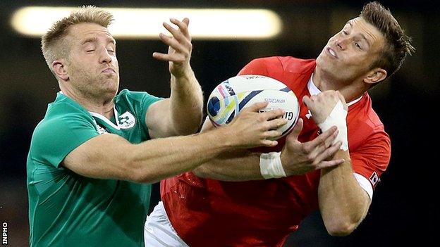 Ireland's inside centre Luke Fitzgerald in action against Matt Evans of Canada