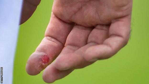 A close up view of Moeen Ali's spinning finger