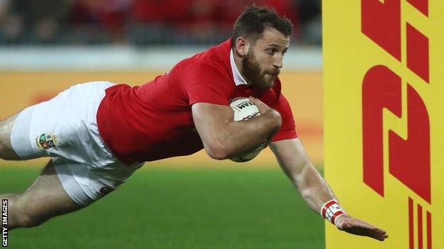 Tommy Seymour dives over for his first score against the Hurricanes